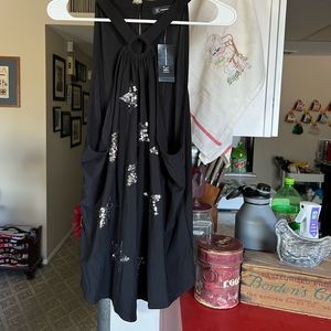 Cute NWT sparkly star shirt. Smoke & Pet free home.  Always open to offers